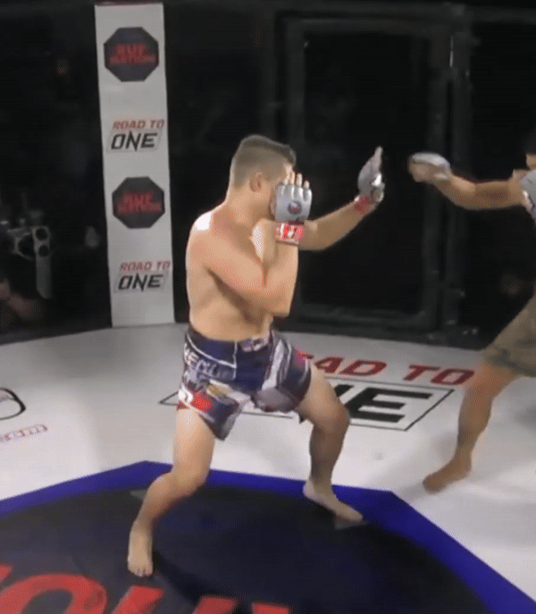 Annotated: the stance, hand position, and inward lead foot