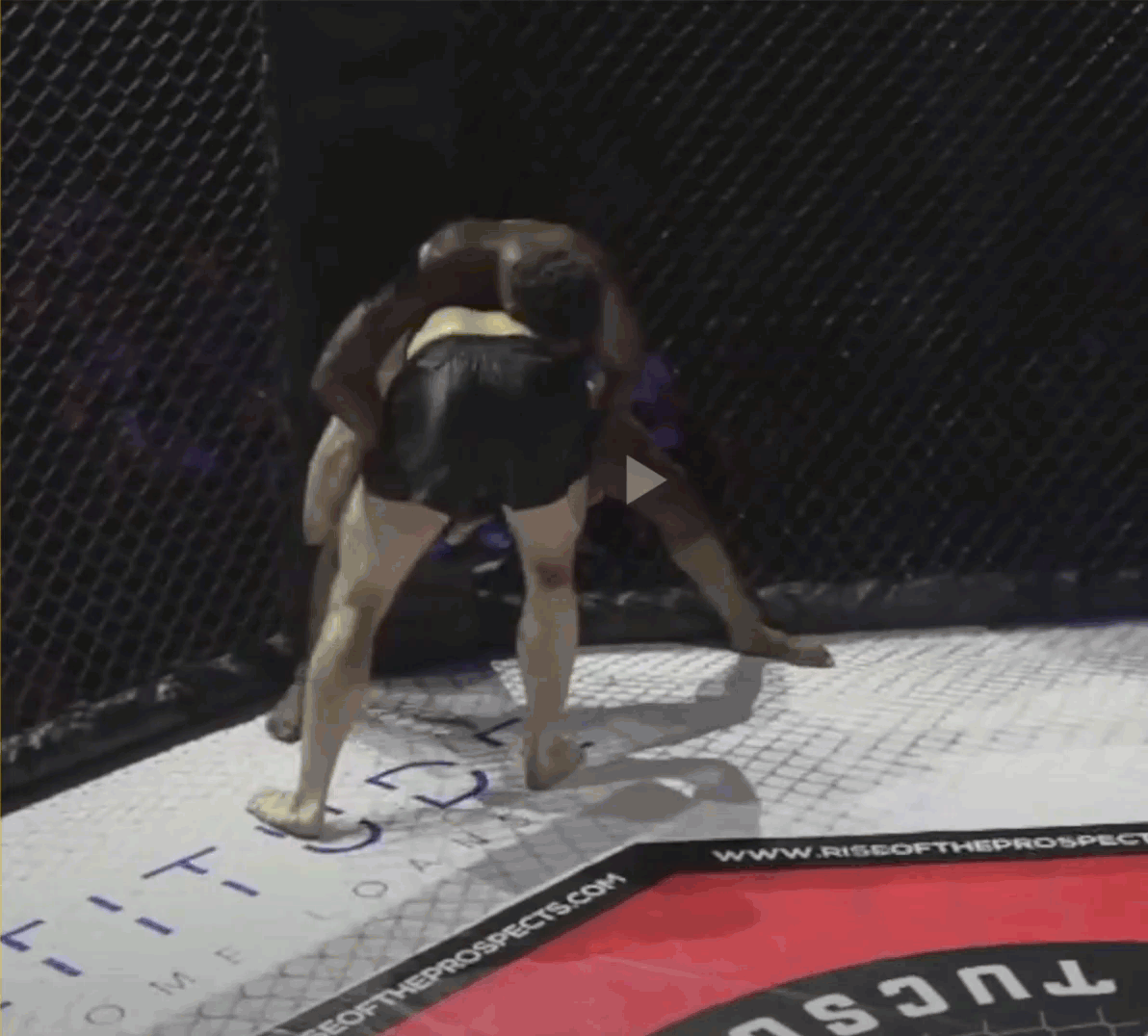 Single leg to double leg attempt against the cage